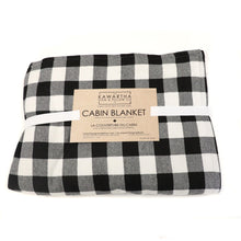 Charger l'image dans la galerie, a black and white checkered blanket