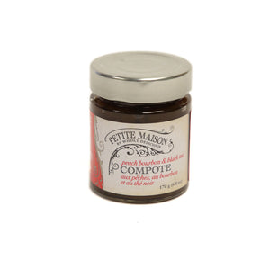 glass jar of compote made with peach, bourbon and black tea 