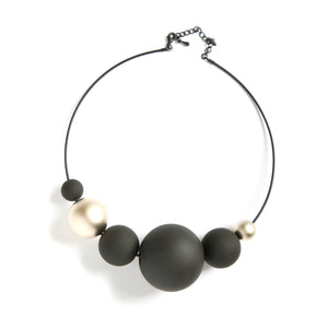 Cuff styled necklace with light weight orbs