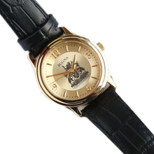 Load image into Gallery viewer, Gold faced women&#39;s watch with imprint of the Legislative Assembly coat of arms