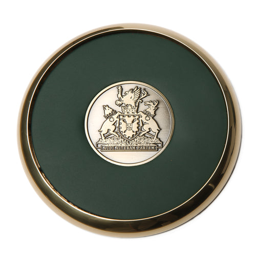brass and green leather coaster with Legislative Assembly of Ontario coat of arms
