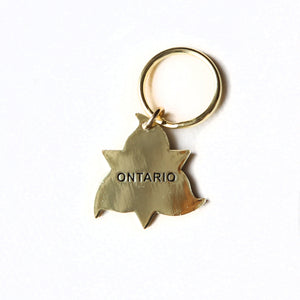 The word Ontario on the back of the trillium keyring