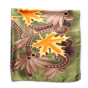 Silk scarf featuring maple leaf artwork in green, orange, yellow and brown from the Legislative Chamber ceiling
