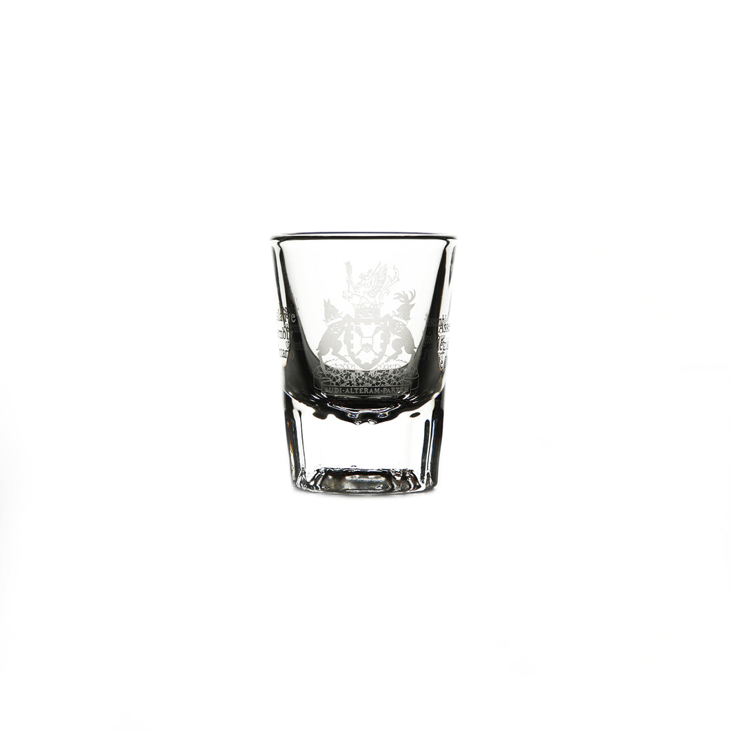 clear shot glass with imprint of the legislative coat of arms 