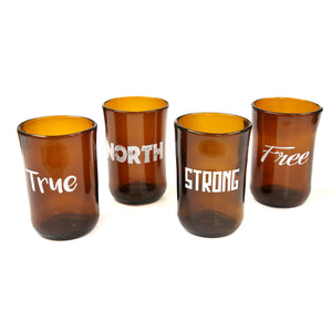 Four tumblers made from brown recycled beer bottles