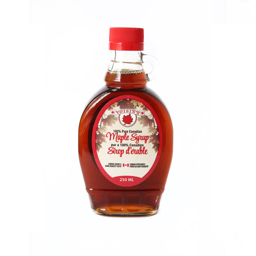 clear glass bottle containing 100% pure Canadian maple syrup